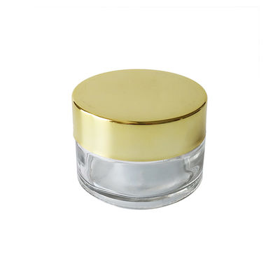 barattolo dell'erbaccia del vetro trasparente 1oz con la prova innocua per i bambini dell'odore del coperchio dell'oro